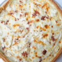 Chicken-Bacon-Ranch Pizza · Inspired by uw's men of 4503, the Chicago chicken-bacon-ranch is a unique combination of ten...