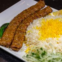 Beef Koobideh (Juicy & Tender) · Skewers of juicy ground beef charbroiled to perfection over an open fire. Served with basmat...