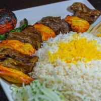Mix Kebab (Chicken & Beef Shish Kabob) · Chicken breast and beef tenderloin marinated and skewered, then grilled served with basmati ...