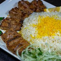 Shish Kebab (Chunks Of Filet - Thumbs Up) · Chunks of deliciously marinated beef charbroiled to cook over an open fire served with basma...
