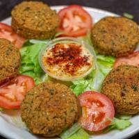 Falafel (Dip Them In)  · Plate spiced mashed chickpeas with herbs or other pulses formed into balls and deep-fried