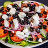 Greek Salad (Cheese It)  · Fresh lettuce mixed with fresh carrots, tomatoes, cucumbers, and onions dressed with a citru...