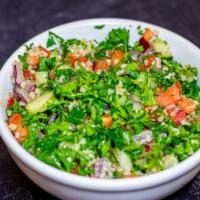 Tabouli Salad (Different)  · Bulgur (crushed wheat) mixed with parsley, onions, fresh tomatoes, cucumbers, and dressed wi...