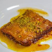 Baklava (Homemade)  · Rich sweet pastry made of layers of phyllo dough filled with chopped nuts and sweetened with...