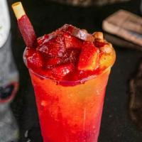Chamoyada · A sweet and spicy type of shaved ice, or raspado, prepared with fresh strawberries, and mang...