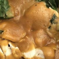 Swimming Rama · Spicy. Your choice stir-fried, topped with peanut sauce, on a bed of spinach