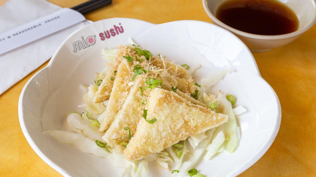 Agedashi Tofu · Vegetarian. Deep fried tofu (4 pc), bonito flakes, green onion, radish, tempura sauce.