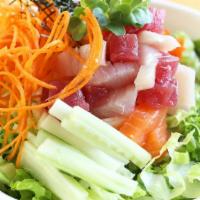 Mio Spicy Chirashi · Assorted sashimi, tobiko, krab, green Leaf lettuce, cucumber, radish sprout, dried seaweed, ...