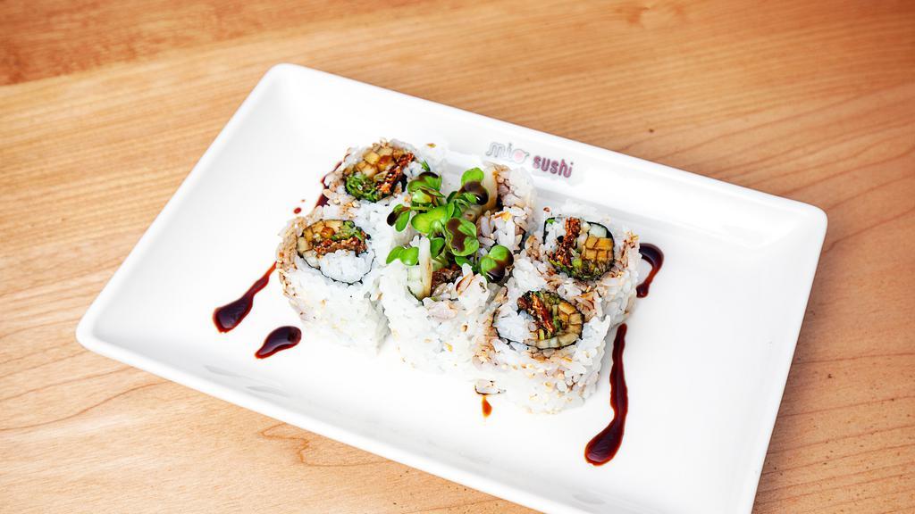 Salmon Skin Roll · Salmon skin, cucumber, radish sprout, green onion and sesame seeds with sweet sauce.
