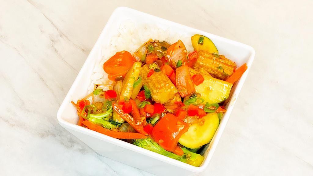 Veggie Stir Fry Bowl · Peppers, onions, broccoli, carrots and zucchini, baby corn stir fried with garlic ginger soy sauce.