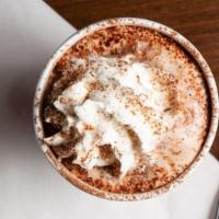 Signature Hot Chocolate · The perfect blend of milk, dark chokolat and cocoa powder.