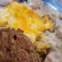 Biscuits & Gravy (Dd) · 2 buttermilk biscuits topped with sausage gravy, served with 2 eggs, & a sausage patty