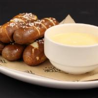 Soft Pretzel Sticks · Cheese & ale fondue.