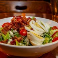 Whole Blue Bayou · Romaine, bacon, chopped egg, blue cheese crumbles, tomato, blue cheese dressing