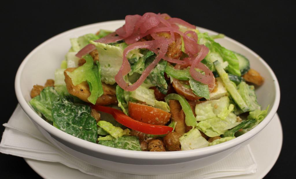 Six Arms Goddess Salad · Romaine, cucumber, tomato, bell peppers, marinated onions, pita chips and Goddess dressing.