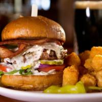 Captain Neon Burger · Blue Cheese dressing and bacon with lettuce, tomato, red onion, pickle.