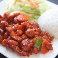 Kung Pao Chicken · Fried chicken tossed with vegetables and roasted peanuts in hot pepper sauce. Served with ri...