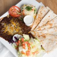 Quesadilla · A large flour tortilla filled with cheese and sliced into 4 parts. With a side of beans, ric...