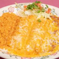 #5. Two Enchiladas · Two corn tortillas rolled and stuffed with cheese and your choice of meat, topped off with o...