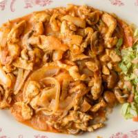Arroz Con Pollo · Boneless chicken breast sauteed in our special sauce with mushrooms and onions. Served on a ...