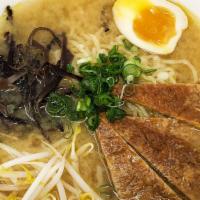 Vegetarian Miso Ramen · Vegetarian miso soup base, served with two half soft-boiled egg, inari (sweet tofu skin by d...