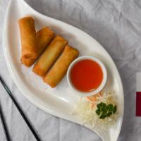 Vegetarian Egg Rolls (4 Pcs) · Ingredients include shredded cabbage, carrots and celery wrapped in wheat egg roll sheet.