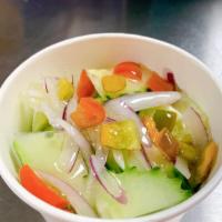 Cucumber Salad · Fresh thick sliced cucumber, red onion, and pepper mix with Thai style sweet vinaigrette dre...