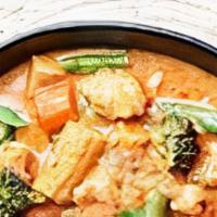 Massaman Curry · Massaman curry, taro, onion, crunchy peanut, coconut milk, crispy fried shallots.