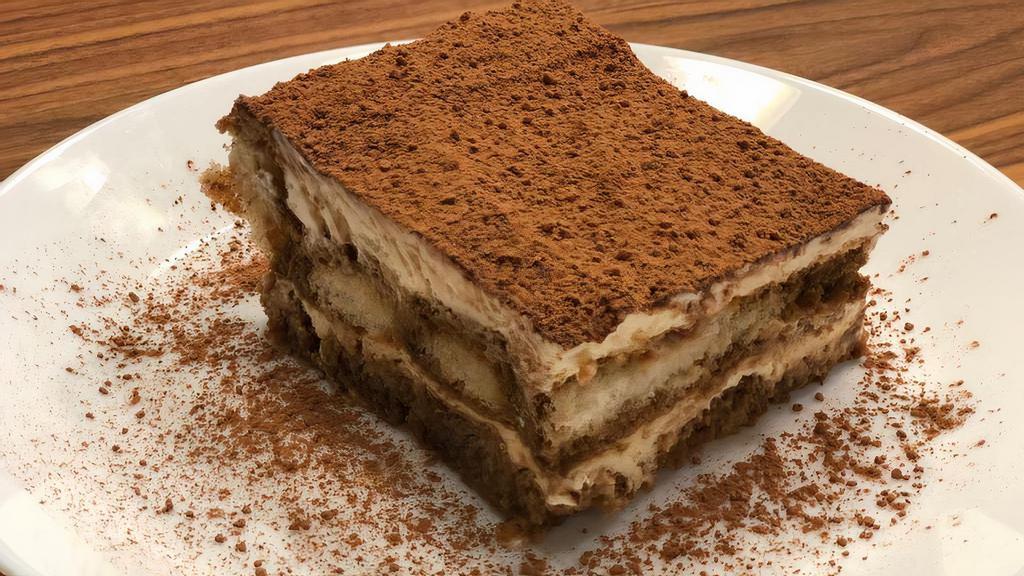 Tiramisu · Tiramisu is a coffee-flavored Italian dessert. It is made of ladyfingers dipped in coffee, layered with a whipped mixture of eggs, sugar and mascarpone cheese, flavored with cocoa.