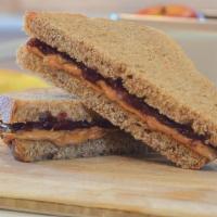 Pb&J · The classic go to peanut butter and jelly sandwich! Served cold on your choice of tasty Grea...