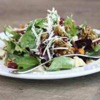 Fresh Seasons · Mixed greens tossed with shaved cabbage, carrots, sliced almonds, sunflower seeds, feta chee...