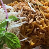 Pad Thai And Basil · Stir fried pad thai noodle with egg, bean sprouts, onion and touch with lime and basil leaf.