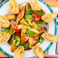 Tsing Tao House Deluxe · Scallops, shrimp, chicken, beef, B.B.Q. pork well mixed with vegetables and fried wonton.