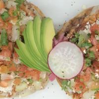 Molletes · Ciabatta bun with spreadable beans and melted cheese + cotija cheese, pico de gallo, pickled...