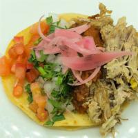 Tacos · Heirloom corn tortillas, topped with your choice of stewed protein, beans, rice, cilantro, r...
