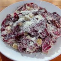 Nostrana · Radicchio, parmigiano, rosemary-sage croutons and caesar-style dressing. Contains raw egg.