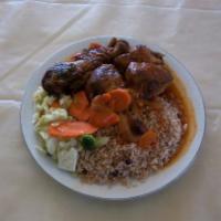 Brown Stew Chicken · Served with your choice of sides.