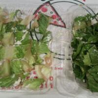 Garden Salad · Fresh lettuce, tomatoes, black olives, mozzarella cheese.