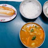 Yellow Curry · Yellow curry with seasonal vegetables, coconut milk and comes with choice of rice, bread or ...