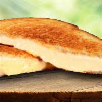 The Convert Grilled Cheese · Melty American cheese on traditional sliced bread