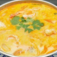 Tom Kha Soup · Coconut milk soup with lemongrass, galangal root, kaffir lime, onion, cilantro, cabbage and ...