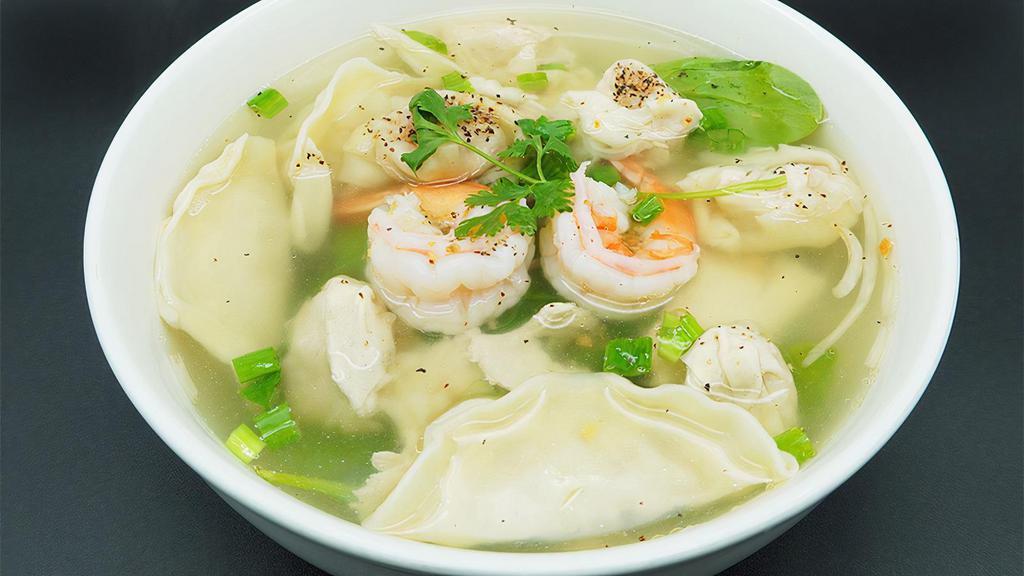 Wonton Soup · Wonton dumplings stuffed with pork and shrimp, green onions, bean sprouts and cilantro in clear broth.