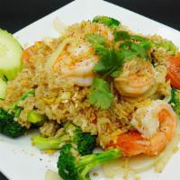 Fried Rice · Fried rice with egg, broccoli, onion and tomato.