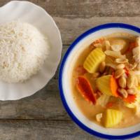 Massaman Curry · Mildly spicy. Potatoes, carrots, onions and peanuts in a rich flavored thai massaman curry s...