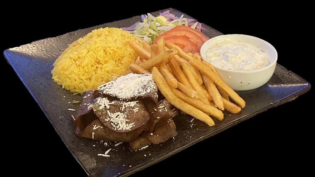 Mega Gyro Bowl · Beef & lamb slices served on saffron rice with lettuce, tomatoes, garlic aioli, fries, grilled onions, tzatziki, and feta cheese