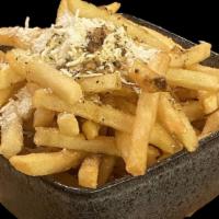 Greek Fries · skinny cut fries topped with feta cheese and Greek season blended into extra virgin olive oil