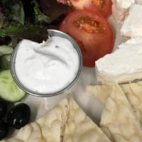 Mediterranean Plate · Sliced warm pita, tzatziki sauce, sliced tomatoes, feta cheese, kalamata olives, sliced onio...