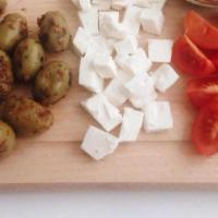 Feta · Feta cheese with olives and tomato