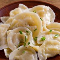 Vareniki · Choice of potato & cheese, cabbage or potato & mushrooms. European style dumpling served hot...