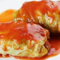 Stuffed Cabbage Rolls (2) · Homemade cabbage leaves stuffed with pork, beed, rice, carrots and spices, simmered to perfe...